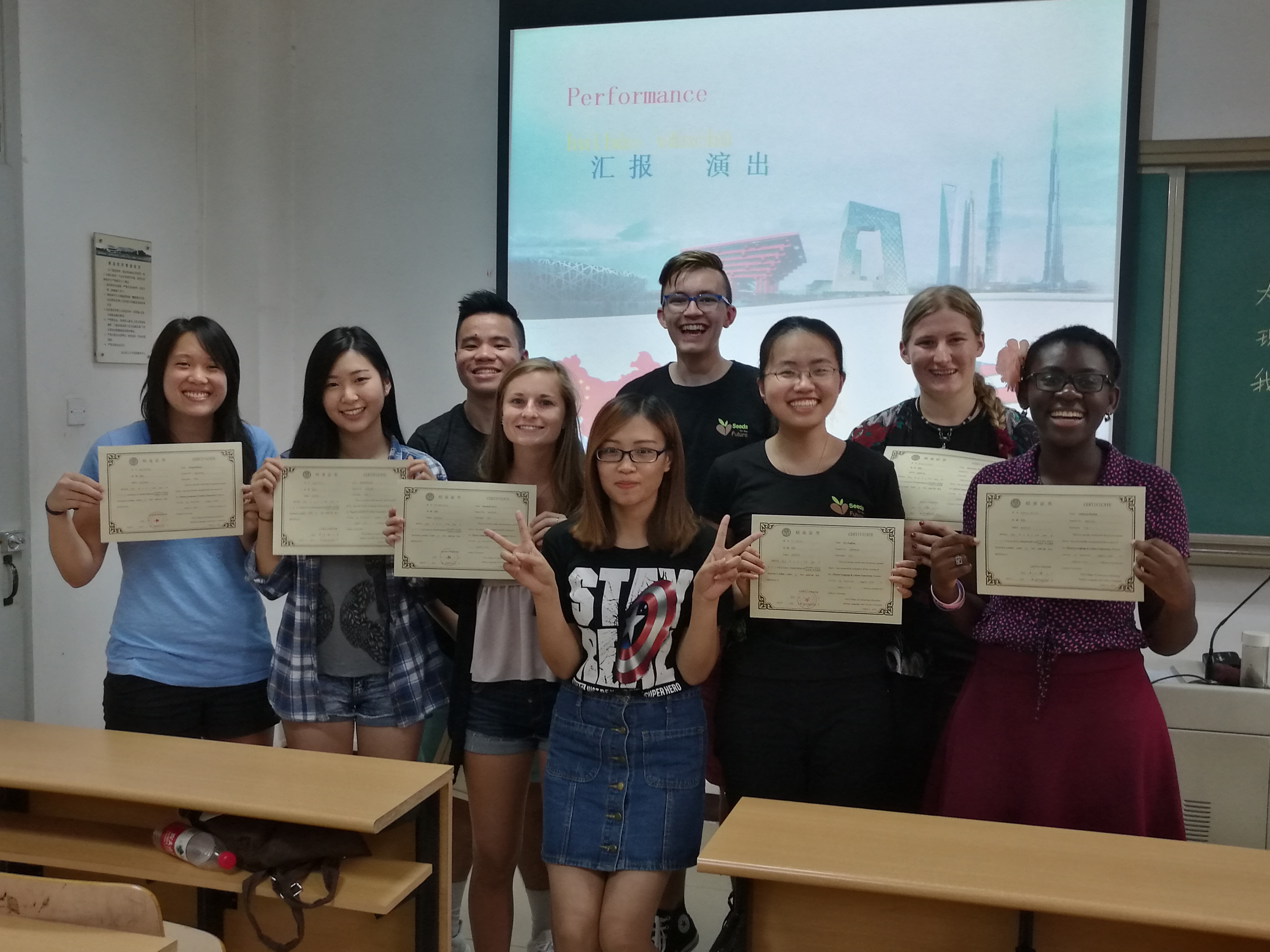 Pictures of Chinese class with completion certificates